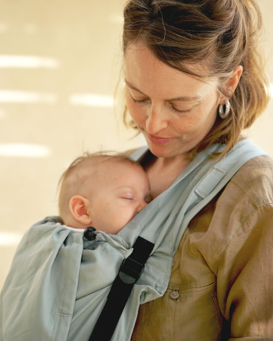 אפור מנטה | Stokke Limas Plus מנשא קשירה פיזיולוגי מתכוונן